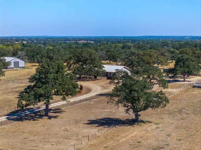 a view of a road with a yard