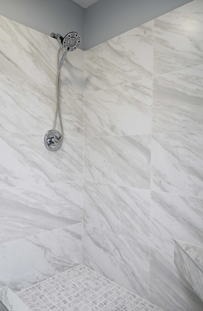 1032 Ripple Ridge, Unit 19 Darien, IL 60561 - Photo 12 of 28 a bathroom with a shower
