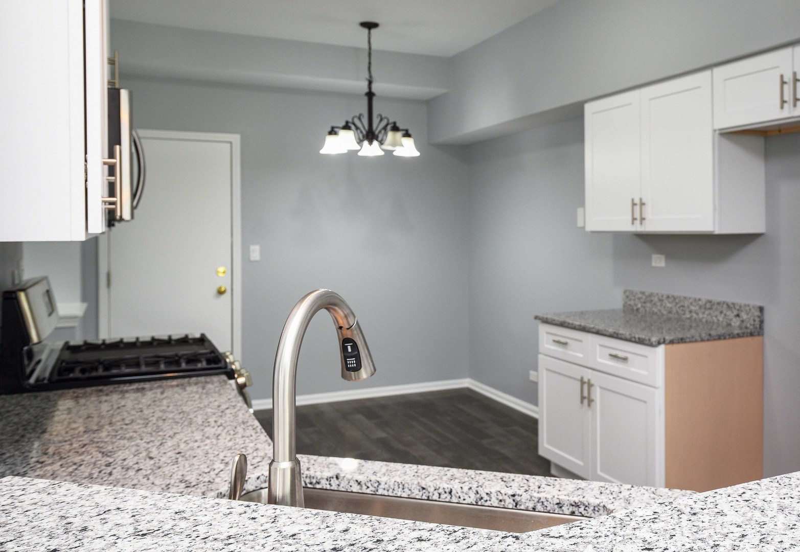 1032 Ripple Ridge, Unit 19 Darien, IL 60561 - Photo 8 of 28 a kitchen with a refrigerator and a stove top oven