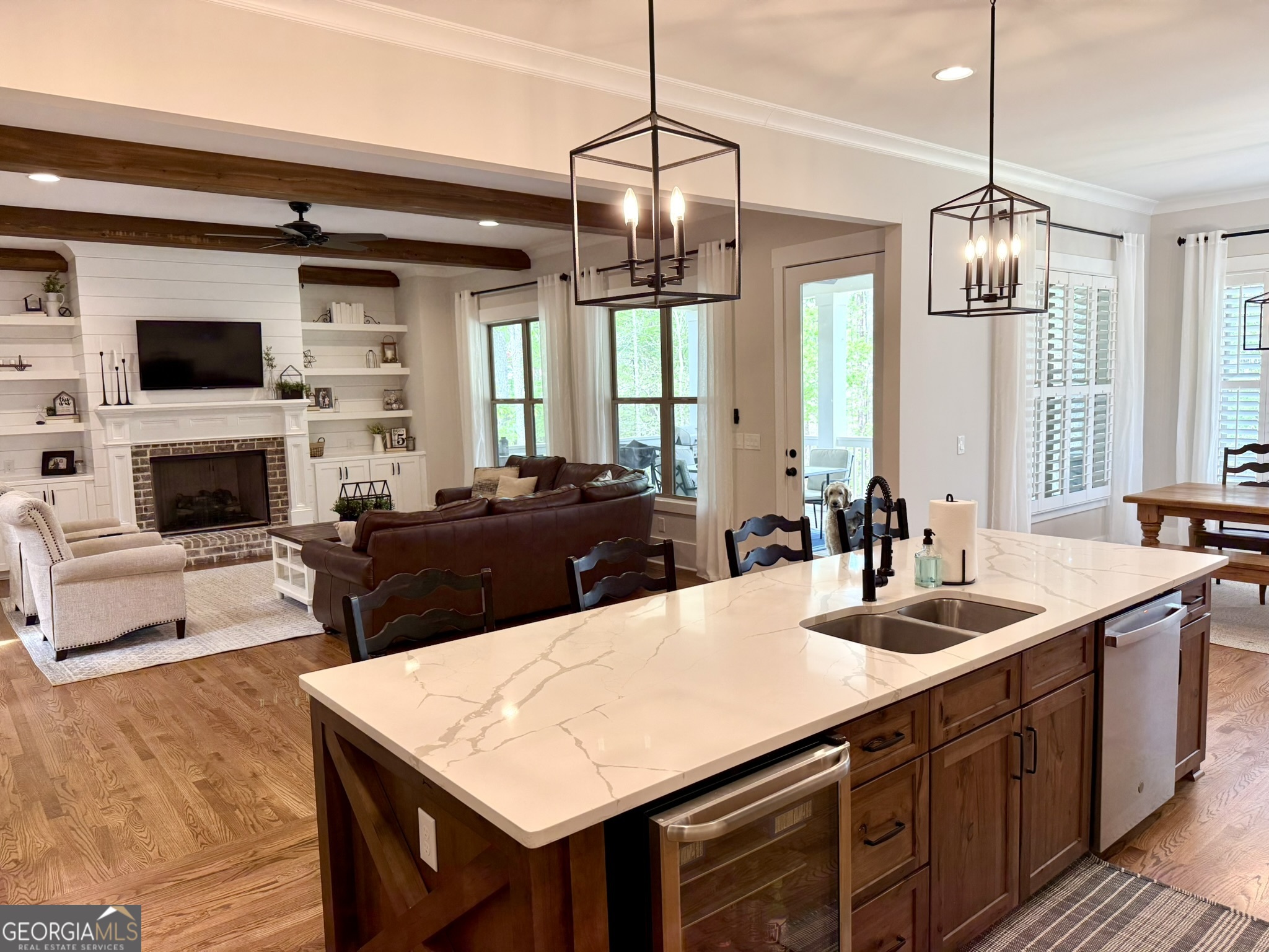 120 Spring Creek Drive Rutledge, GA 30663 - Photo 10 of 38 a large kitchen with sink a center island and couches