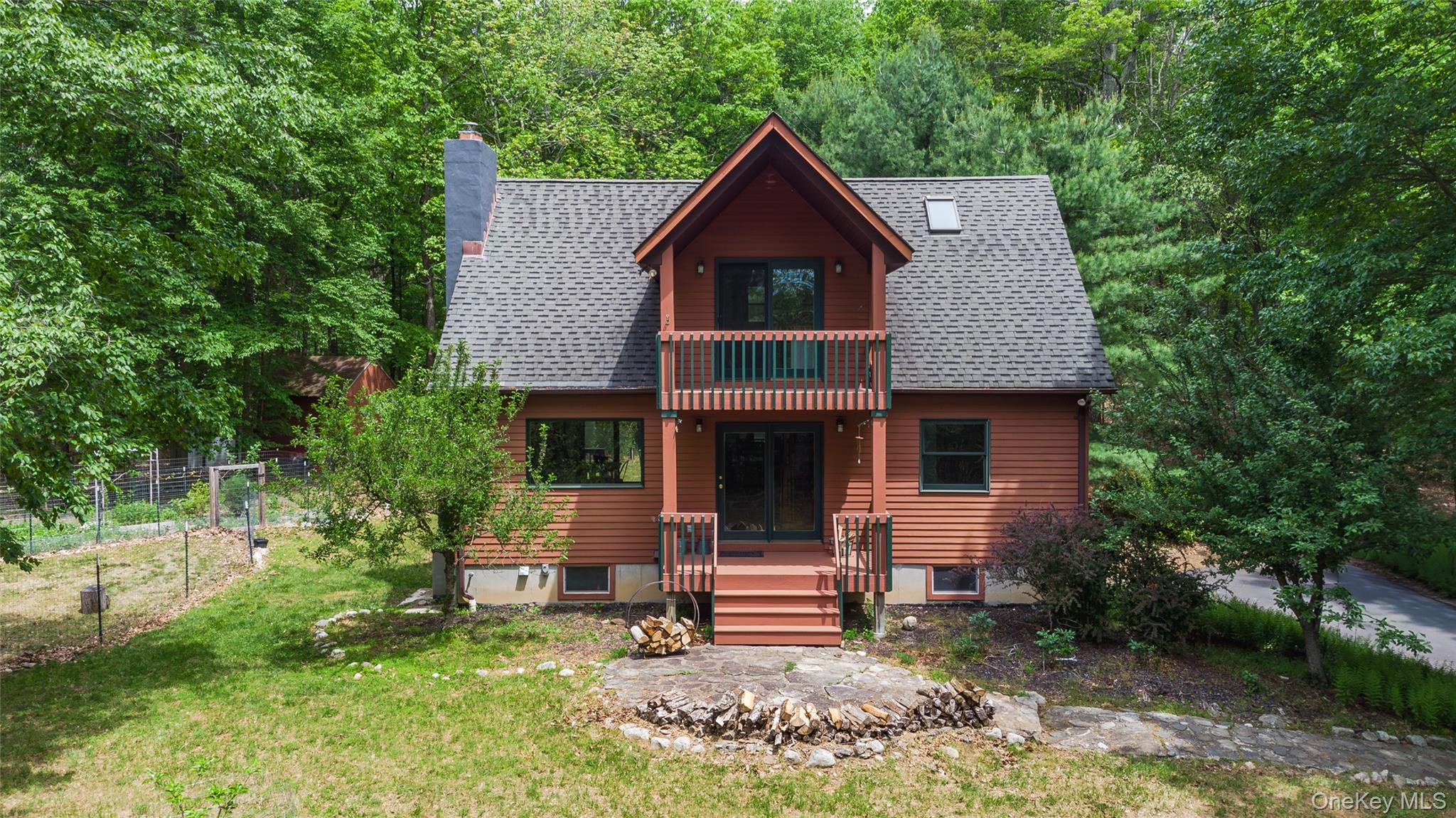 182 Frey Road Pine Bush, NY 12566 - Photo 1 of 33 a front view of a house with a garden and sitting area