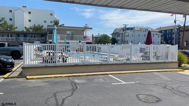 a bedroom with a bed and a chair