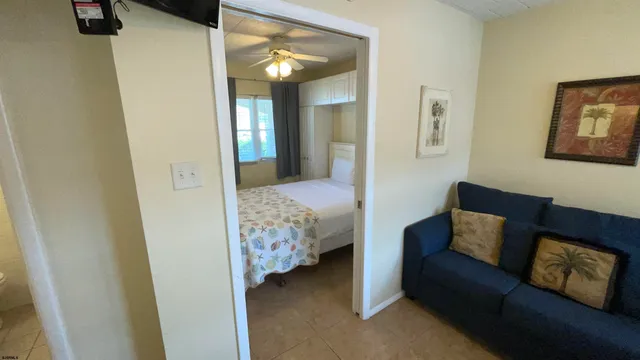 a kitchen with a refrigerator and a sink