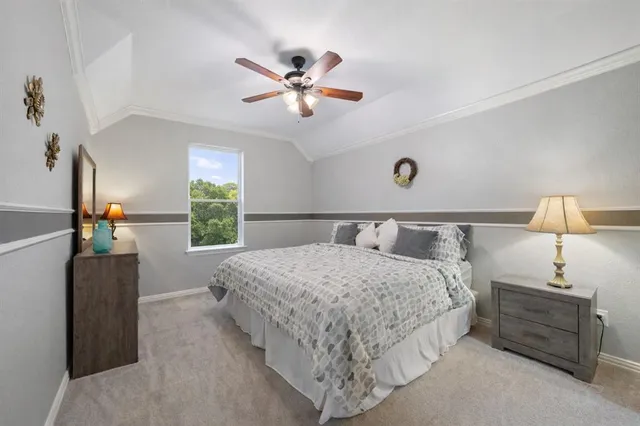 a bedroom with bed and window