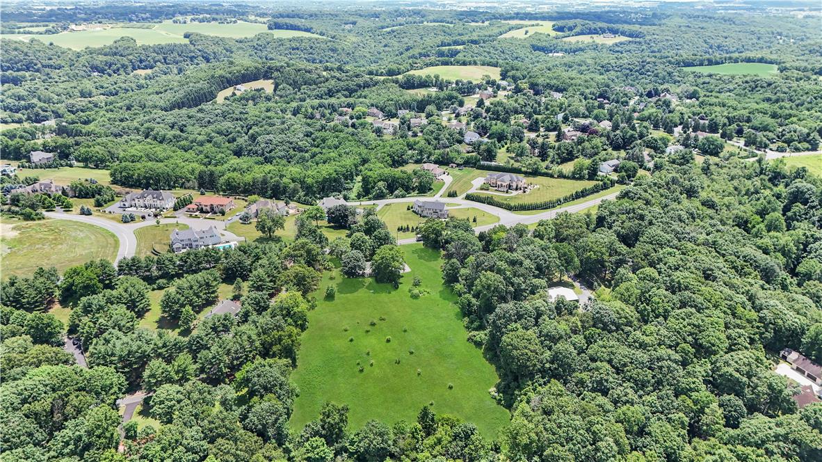5747 Kernsville Road Orefield, PA 18069 - Photo 53 of 56 an aerial view of residential house with outdoor space and trees all around