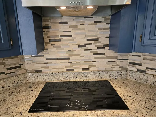 a bathroom with a sink a vanity and a mirror