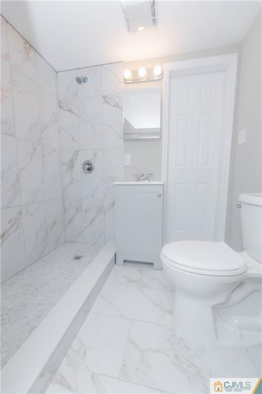 7 North Shore Boulevard Helmetta, NJ 08828 - Photo 18 of 50 a bathroom with a toilet a sink and shower