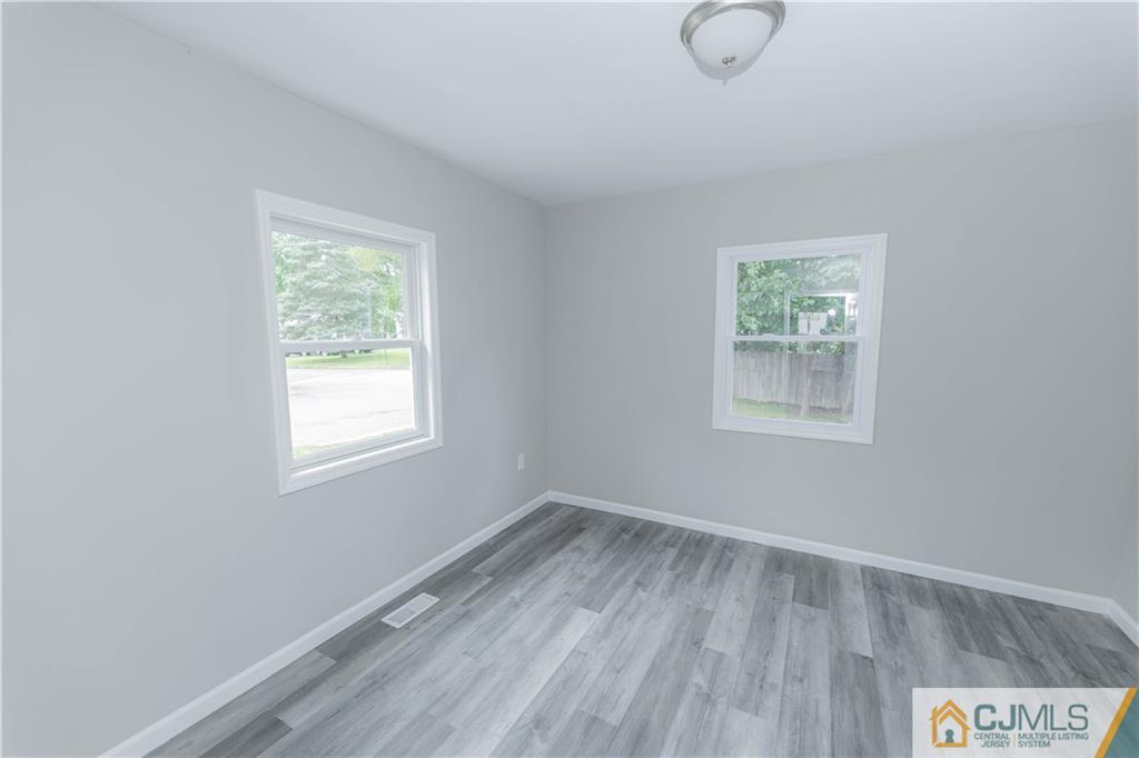 7 North Shore Boulevard Helmetta, NJ 08828 - Photo 27 of 50 a view of a room with wooden floor and windows