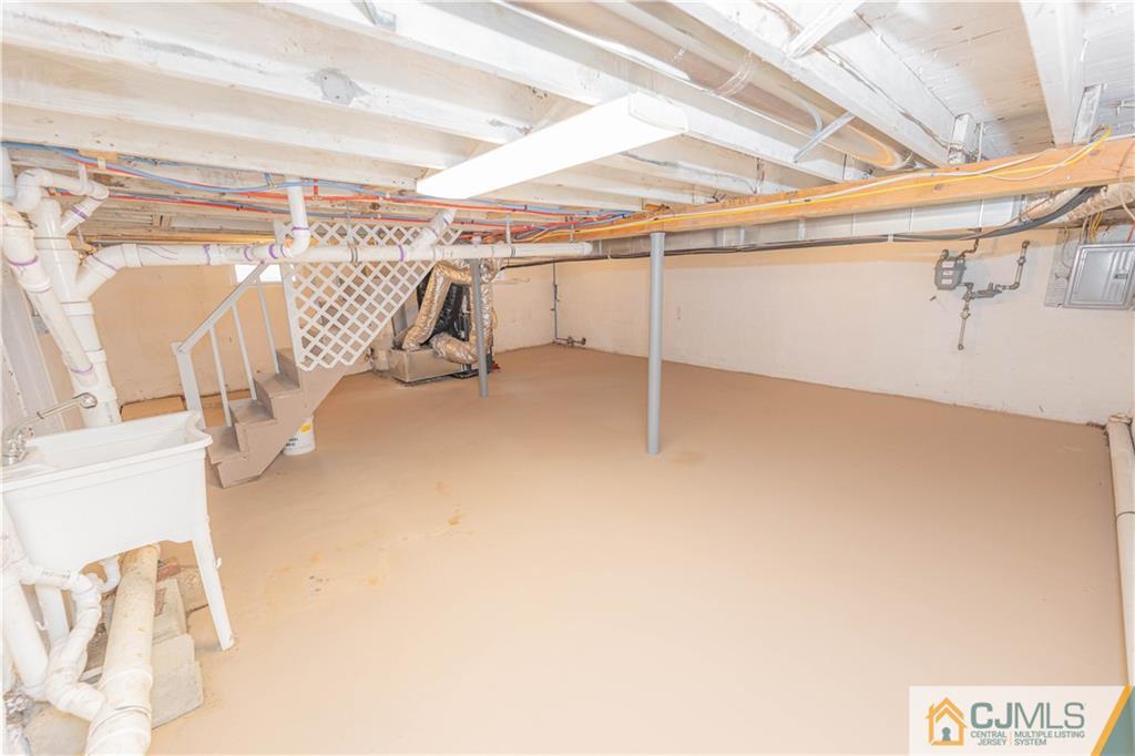 7 North Shore Boulevard Helmetta, NJ 08828 - Photo 37 of 50 a view of a room with racks on the wall