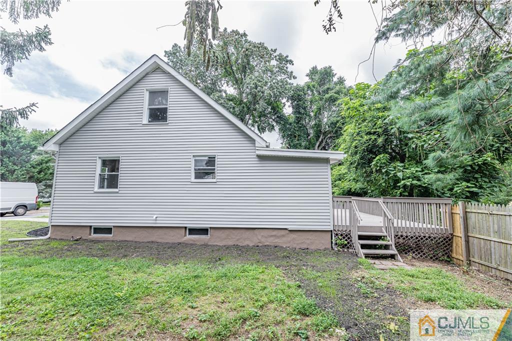 7 North Shore Boulevard Helmetta, NJ 08828 - Photo 41 of 50 a view of backyard with barbeque and bench