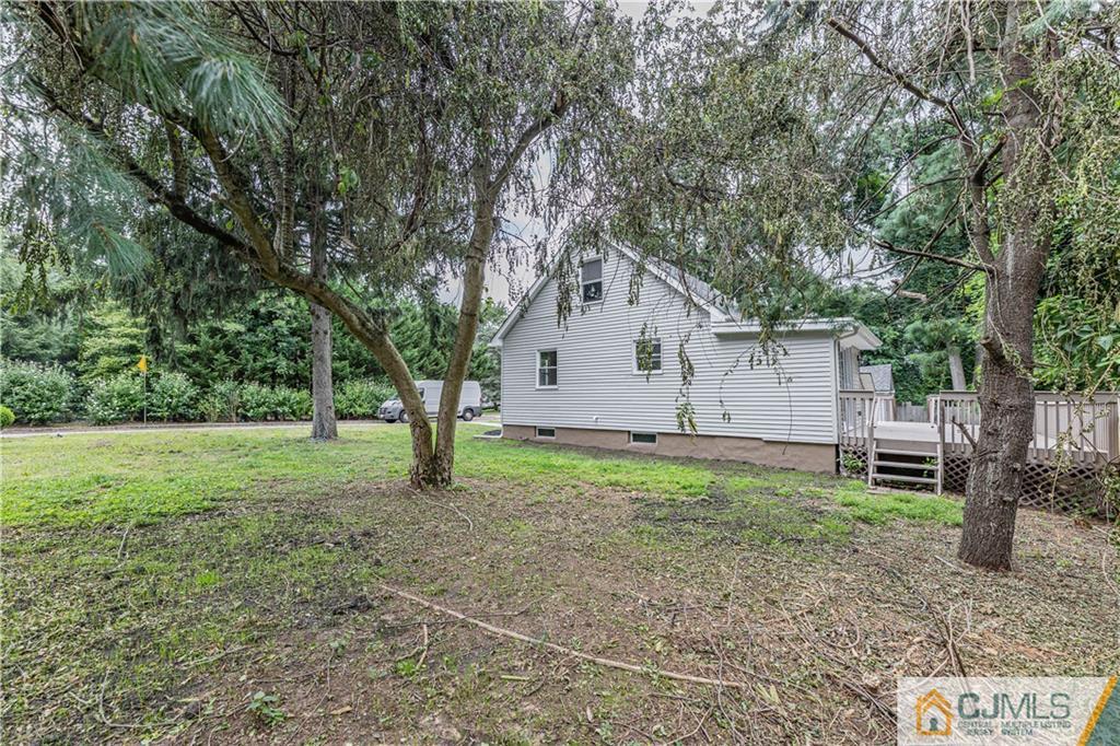 7 North Shore Boulevard Helmetta, NJ 08828 - Photo 42 of 50 a view of a house with backyard and a tree