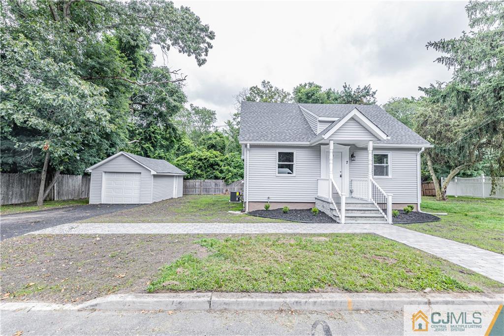 7 North Shore Boulevard Helmetta, NJ 08828 - Photo 46 of 50 a front view of a house with garden