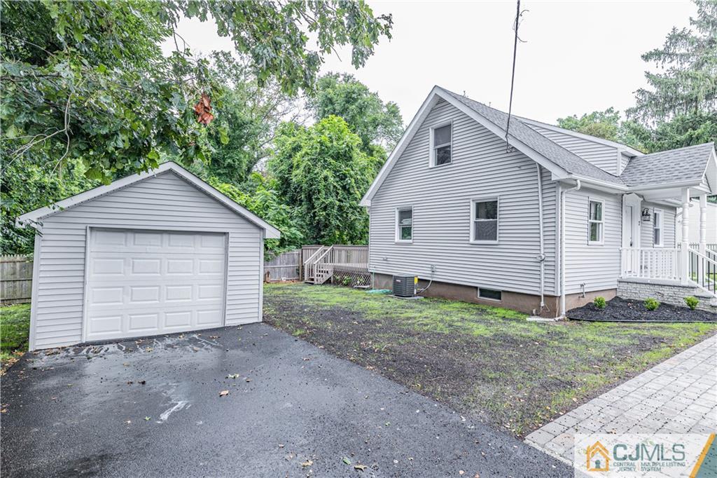 7 North Shore Boulevard Helmetta, NJ 08828 - Photo 50 of 50 a view of a house with a yard and garage