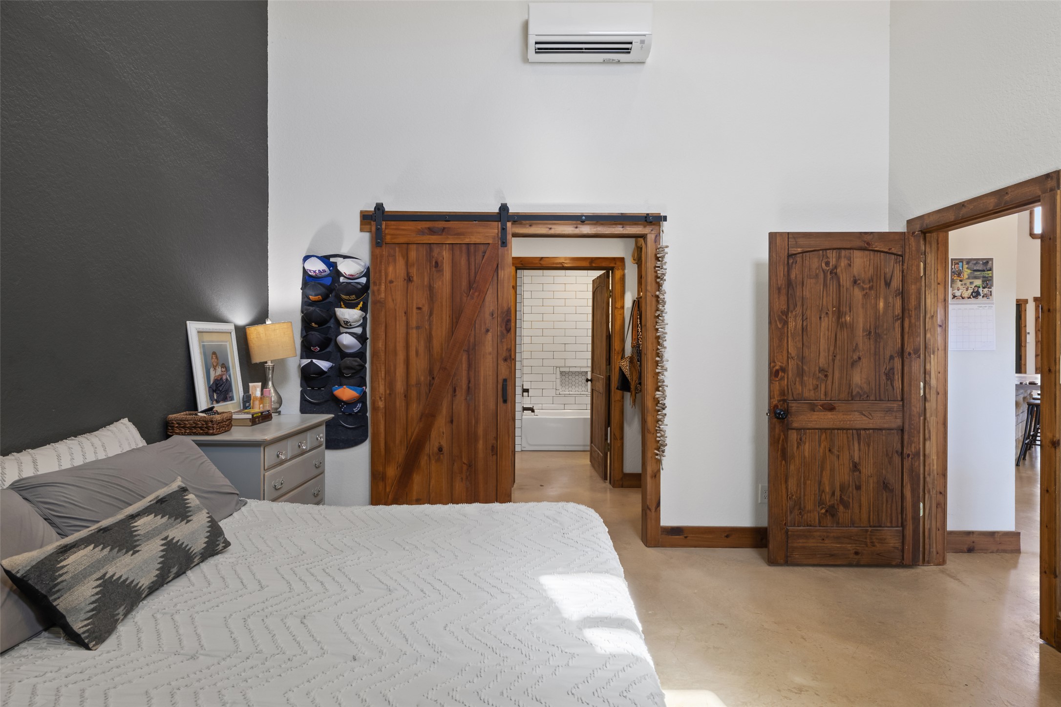 664 Martindale Falls Road Martindale, TX 78655 - Photo 15 of 21 a bedroom with bed and washing machine