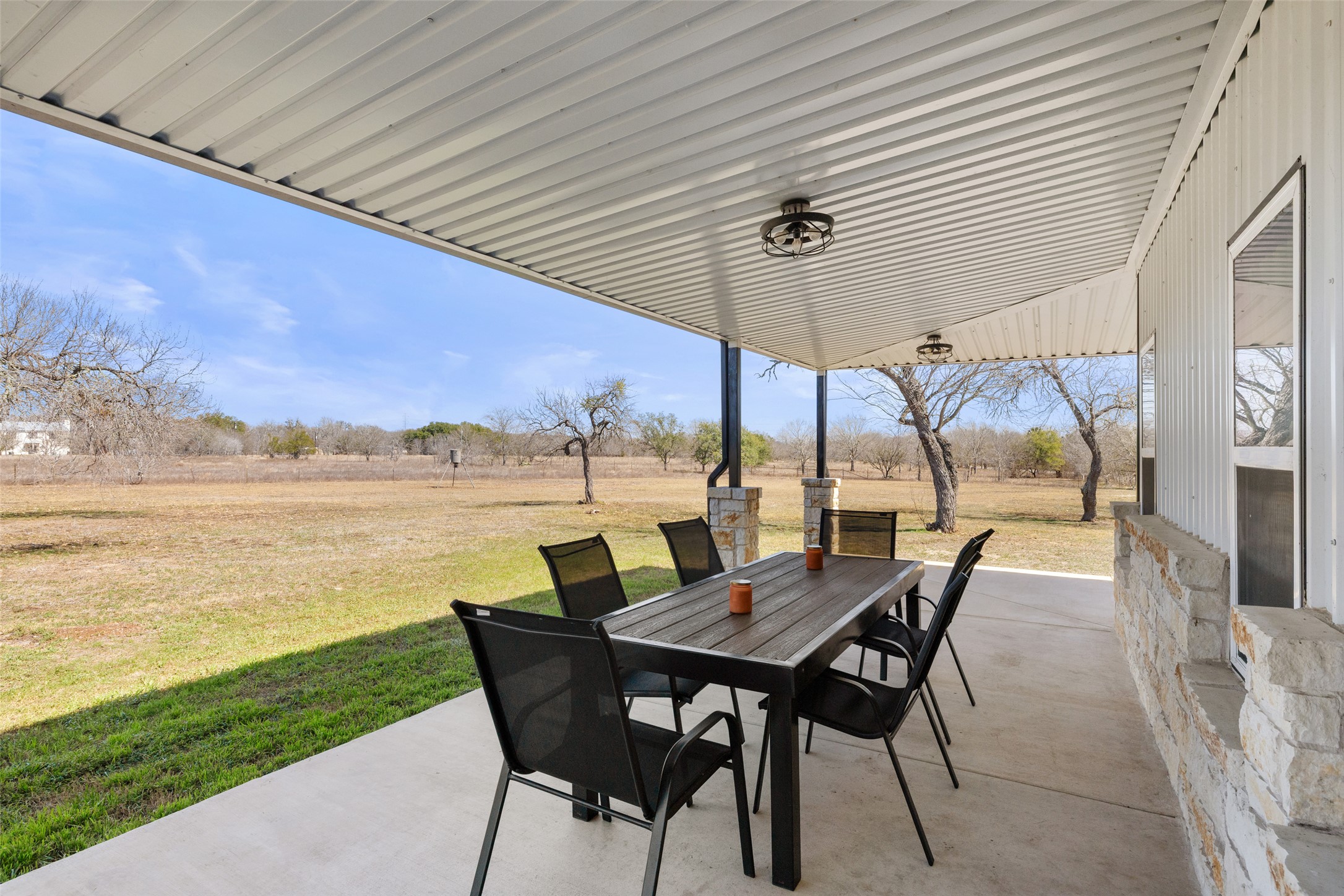 664 Martindale Falls Road Martindale, TX 78655 - Photo 17 of 21 a view of an outdoor space with furniture and garden