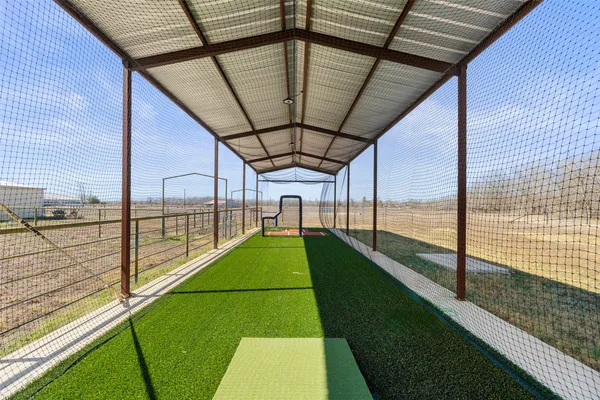 a view of a balcony with a floor to ceiling window