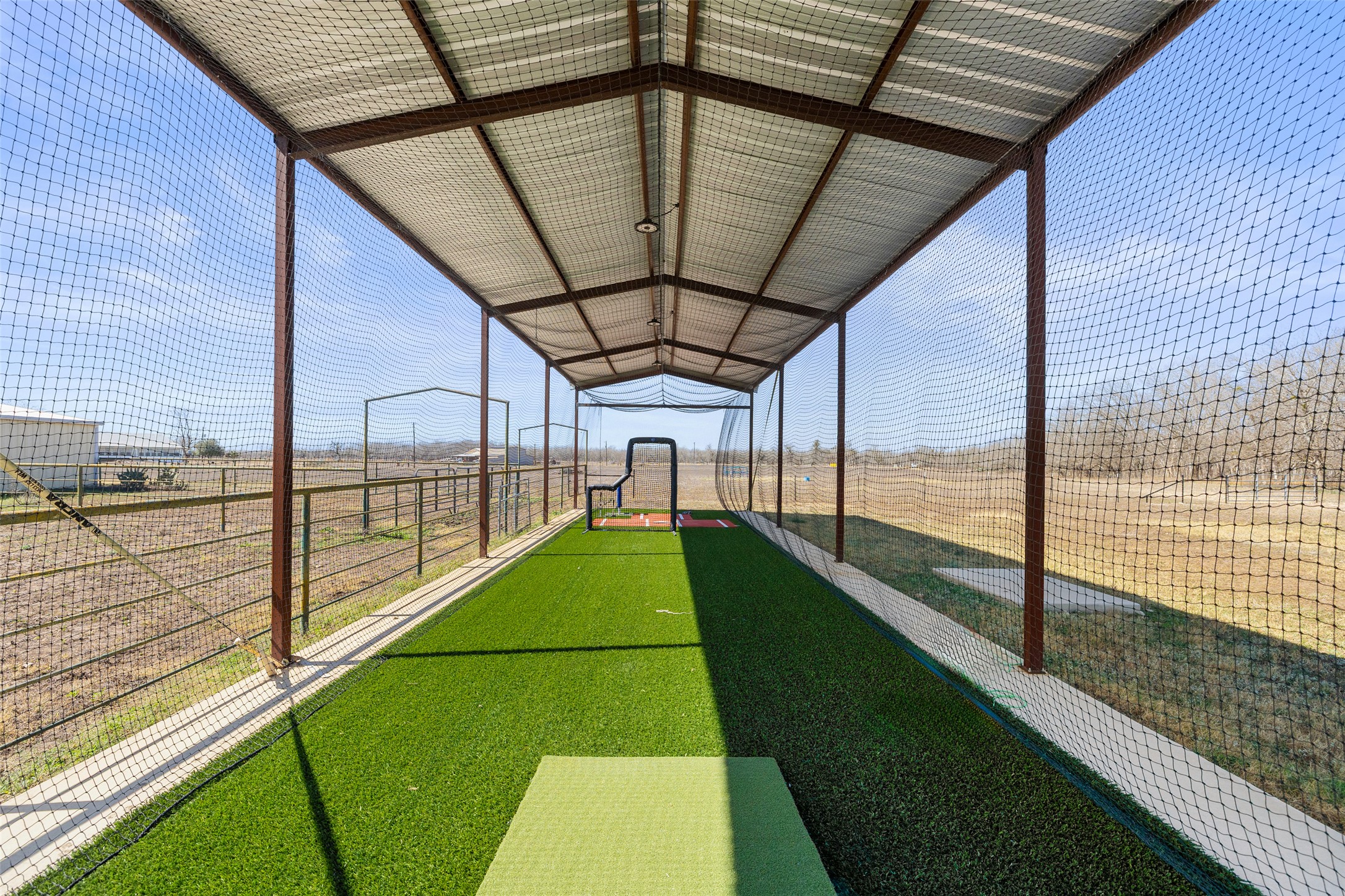 664 Martindale Falls Road Martindale, TX 78655 - Photo 20 of 21 a view of a balcony with a floor to ceiling window