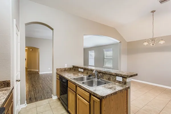 a bathroom with a sink a vanity and a mirror