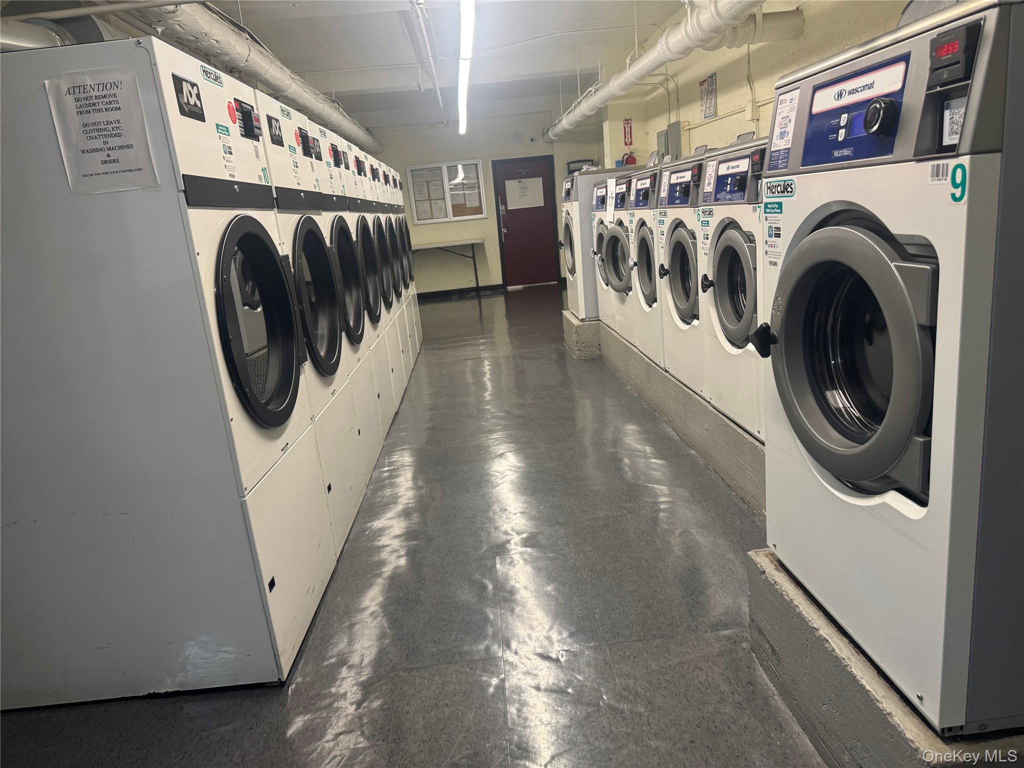 64-34 102nd Street, Unit 7F Queens, NY 11374 - Photo 15 of 17 a utility room with dryer and washer