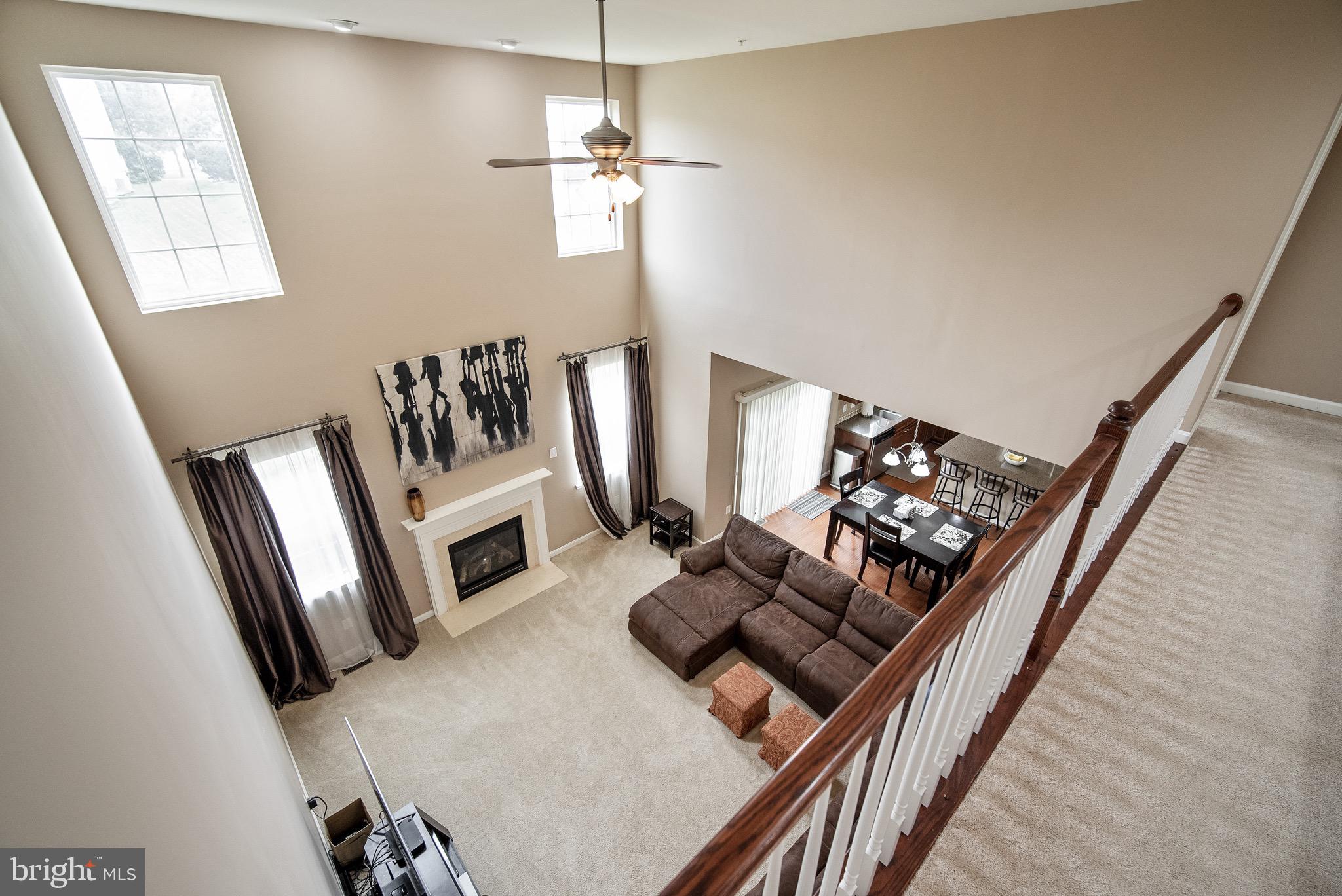 13919 Schaeffer Road Boyds, MD 20841 - Photo 11 of 30 View of family room from upper level
