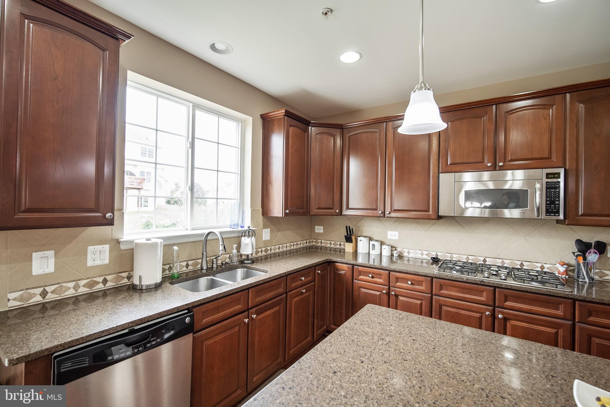 13919 Schaeffer Road Boyds, MD 20841 - Photo 14 of 30 Gas cook top and stainless steel appliances