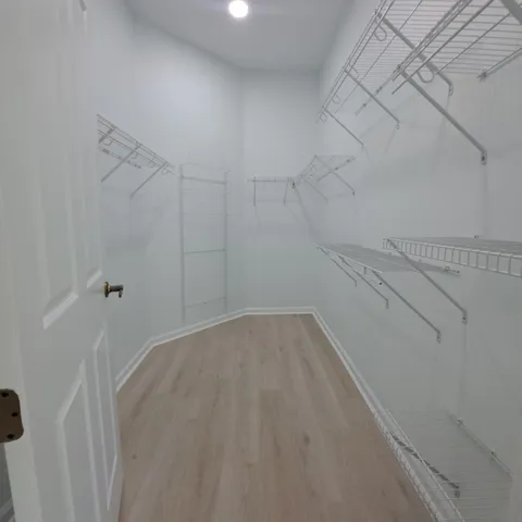 a view of a room with racks on the wall