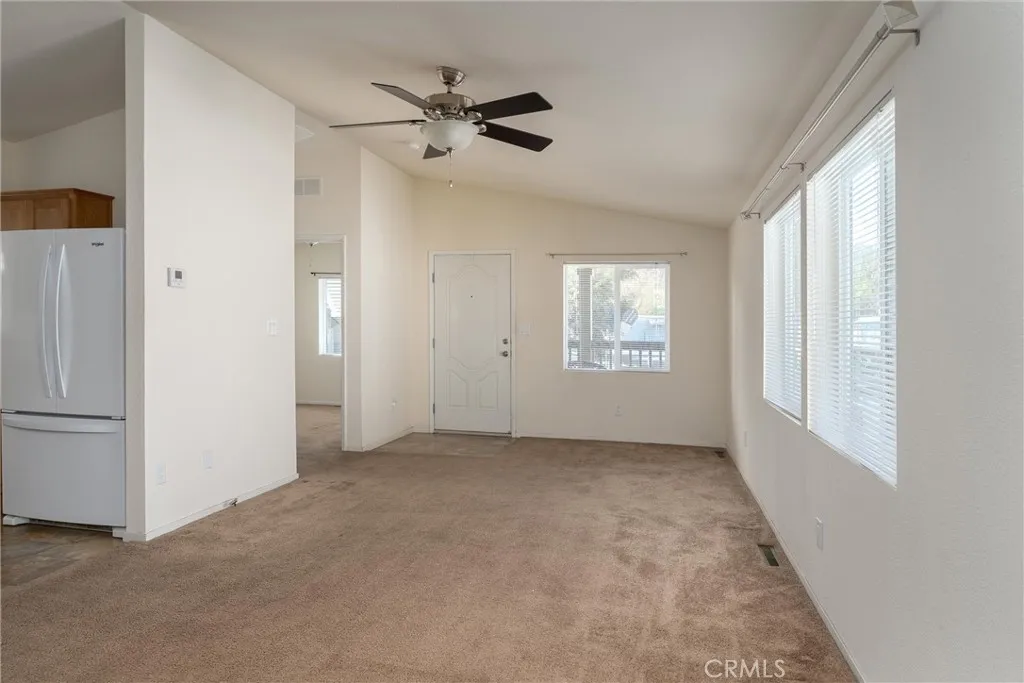 567 East Lassen Avenue, Unit 109 Chico, CA 95928 - Photo 8 of 34 an empty room with windows and closet