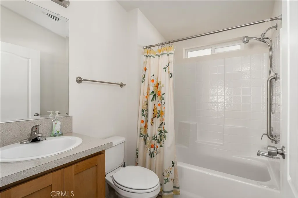 567 East Lassen Avenue, Unit 109 Chico, CA 95928 - Photo 9 of 34 a bathroom with a sink a toilet and shower