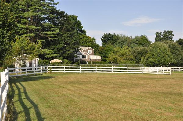 699 Main Street Boxford, MA 01921 - Photo 4 of 21 a view of a swimming pool with an ocean view