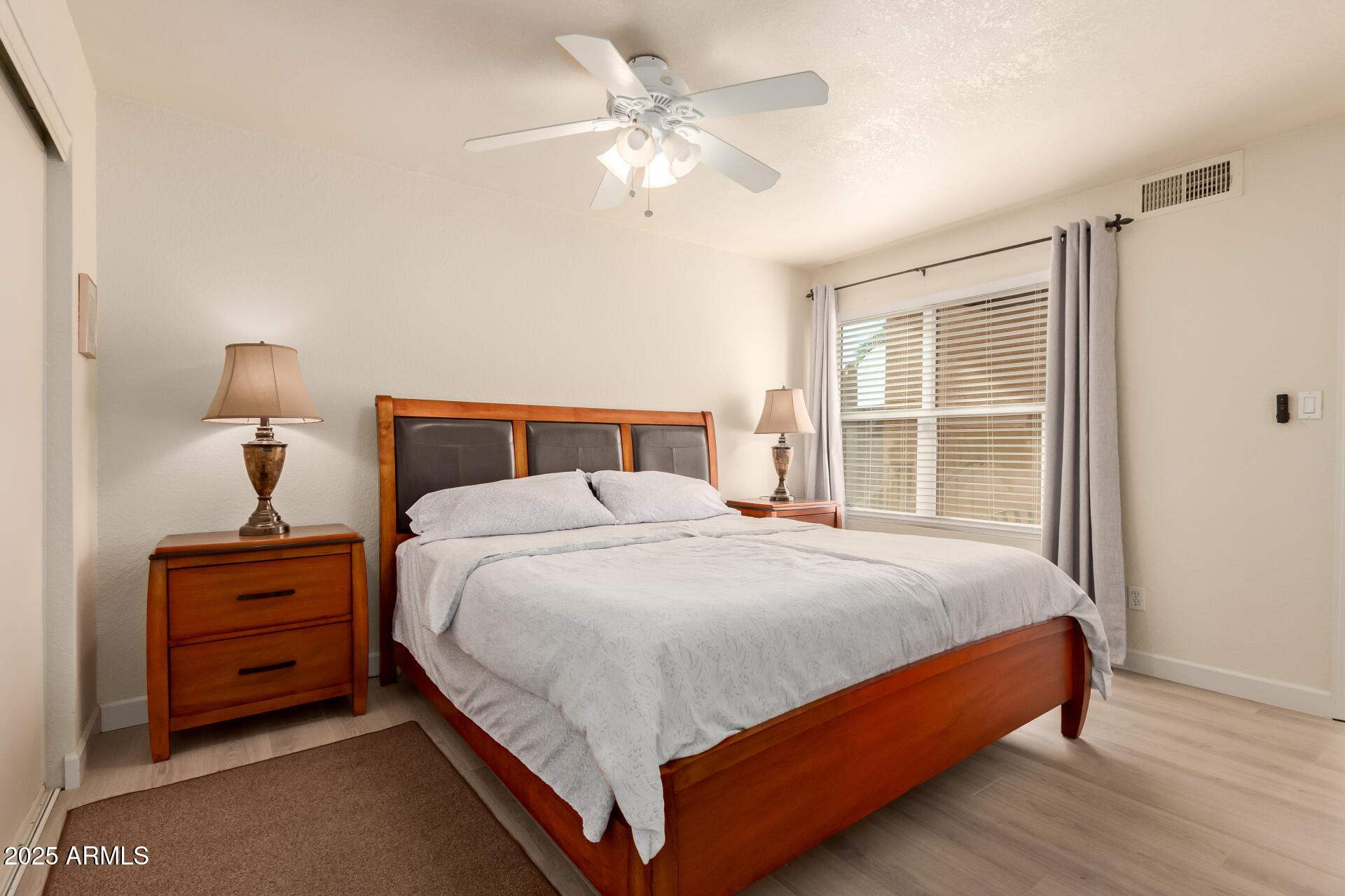8787 East Mountain View Road, Unit 2015 Scottsdale, AZ 85258 - Photo 17 of 31 a bedroom with bed and window