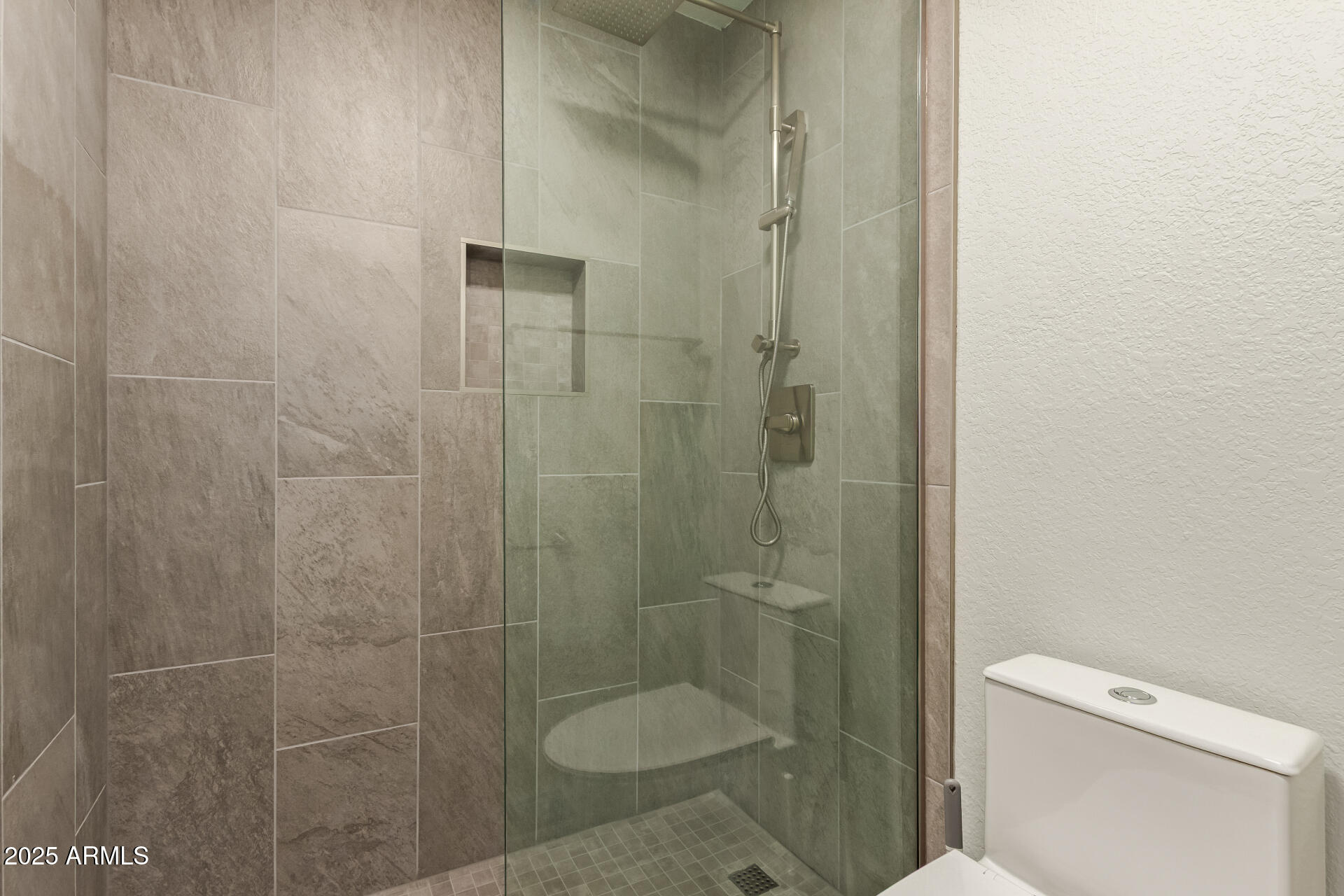 8787 East Mountain View Road, Unit 2015 Scottsdale, AZ 85258 - Photo 21 of 31 a bathroom with a shower and a toilet