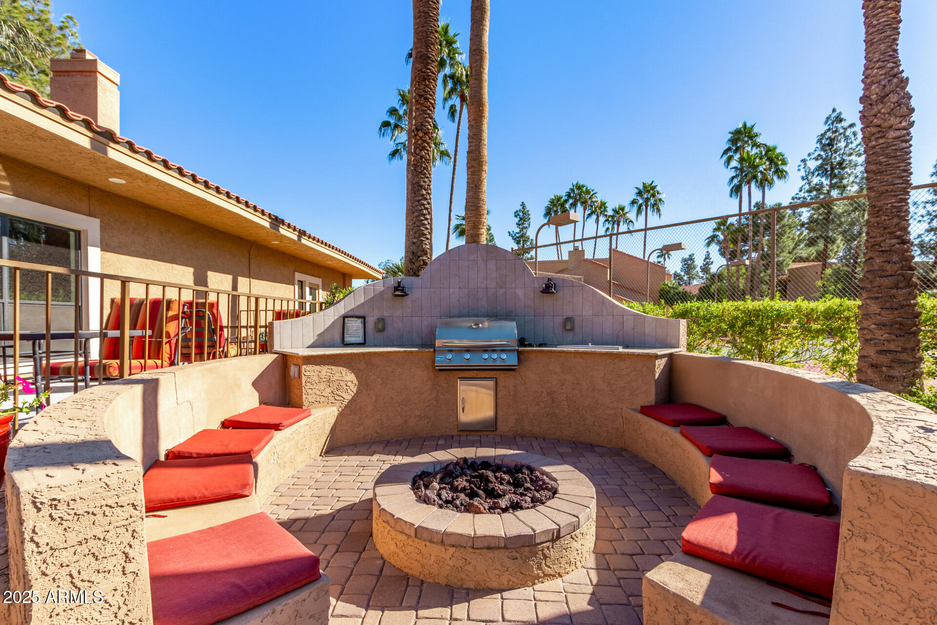 8787 East Mountain View Road, Unit 2015 Scottsdale, AZ 85258 - Photo 28 of 31 a view of a chairs and table in the patio