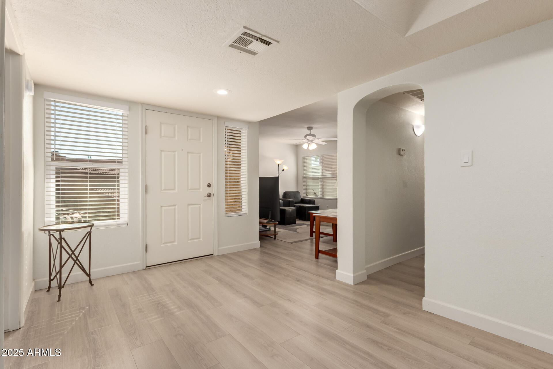 8787 East Mountain View Road, Unit 2015 Scottsdale, AZ 85258 - Photo 6 of 31 a view of livingroom with furniture and windows