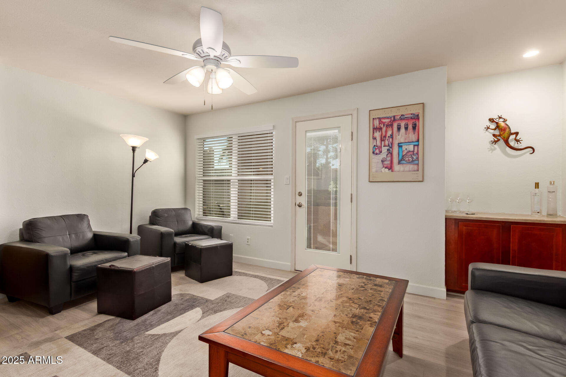 8787 East Mountain View Road, Unit 2015 Scottsdale, AZ 85258 - Photo 8 of 31 a living room with furniture and wooden floor