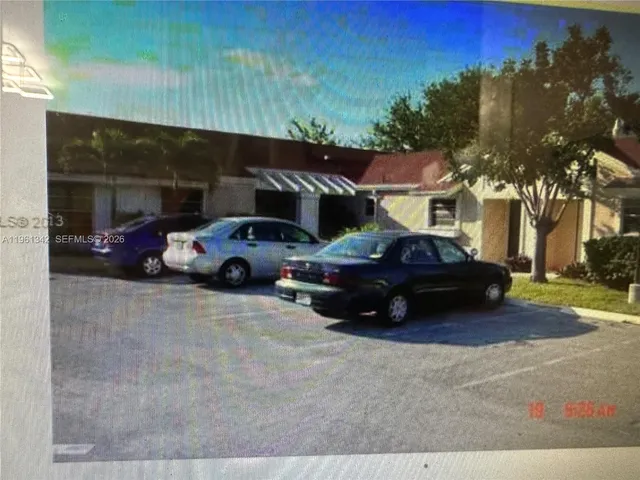a car parked in front of a building
