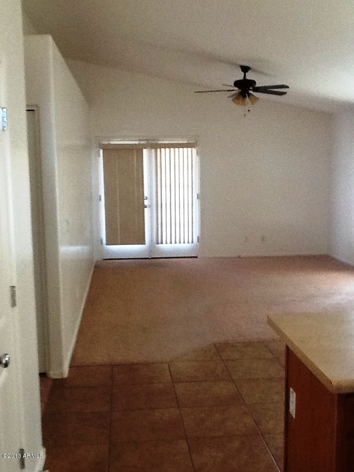 2748 West Grenadine Road Phoenix, AZ 85041 - Photo 5 of 6 Family Room 2