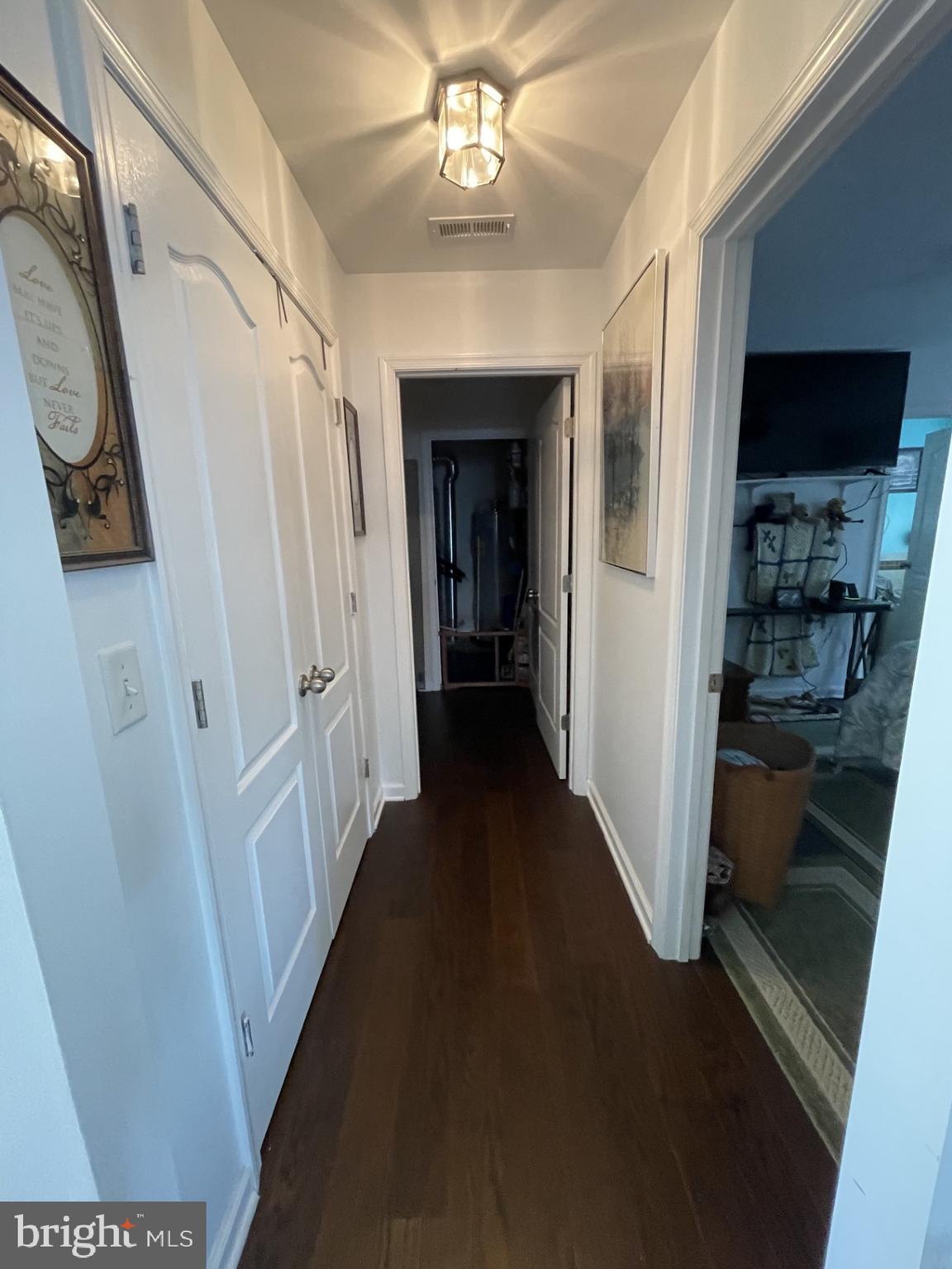 720 Deep Landing Road Chestertown, MD 21620 - Photo 21 of 42 hallway to Owners suite, laundry and mechanicals
