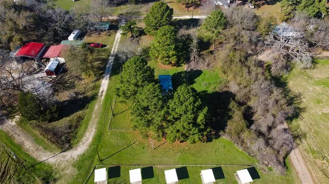 an aerial view of residential house with outdoor space