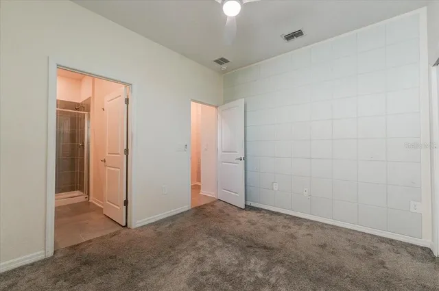 an empty room with a bathroom