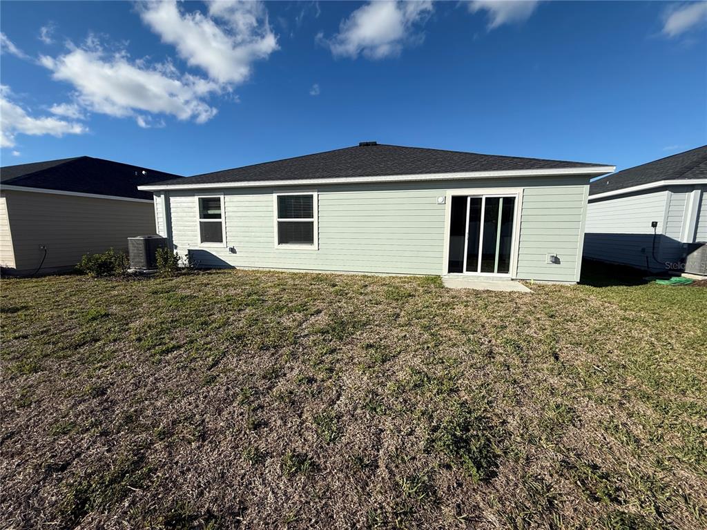 4612 Southwest 84th St Road Ocala, FL 34476 - Photo 11 of 12 a view of a house with a yard