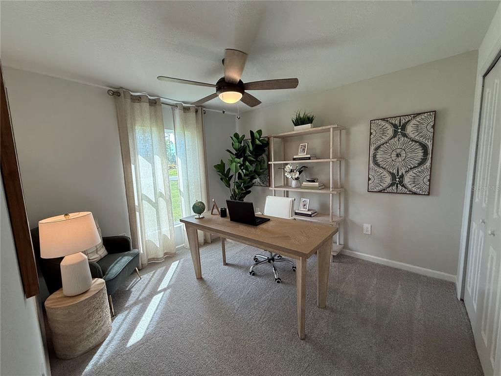 4612 Southwest 84th St Road Ocala, FL 34476 - Photo 4 of 12 a room with furniture and a window