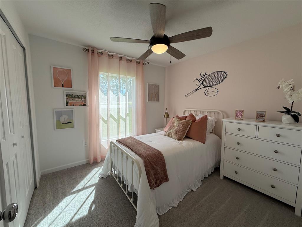 4612 Southwest 84th St Road Ocala, FL 34476 - Photo 5 of 12 a bedroom with a bed and a window