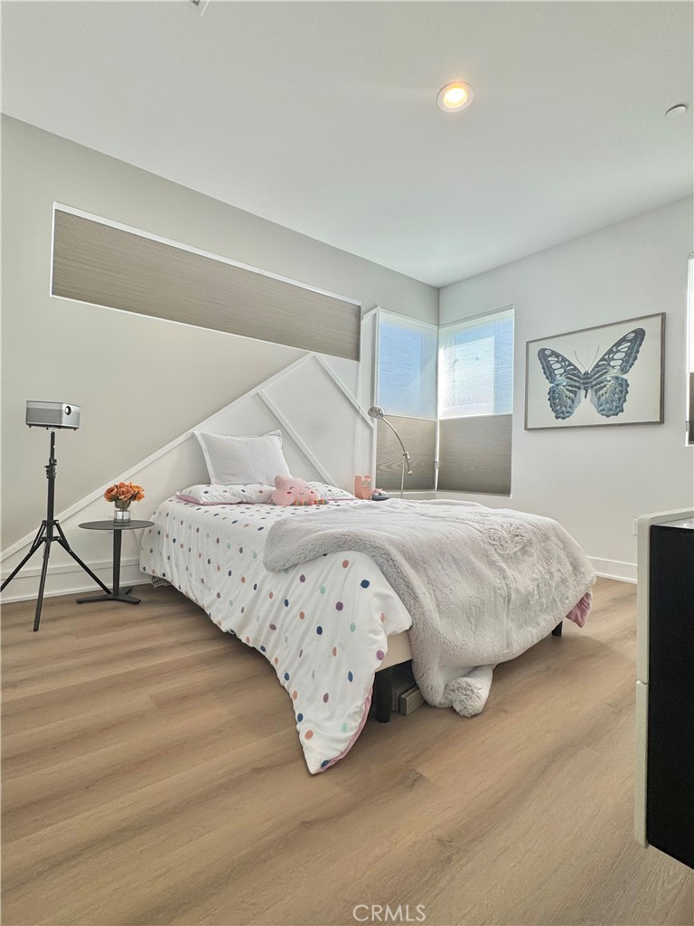 20401 Aberdeen Lane Porter Ranch, CA 91326 - Photo 14 of 21 a bedroom with a bed and a night stand