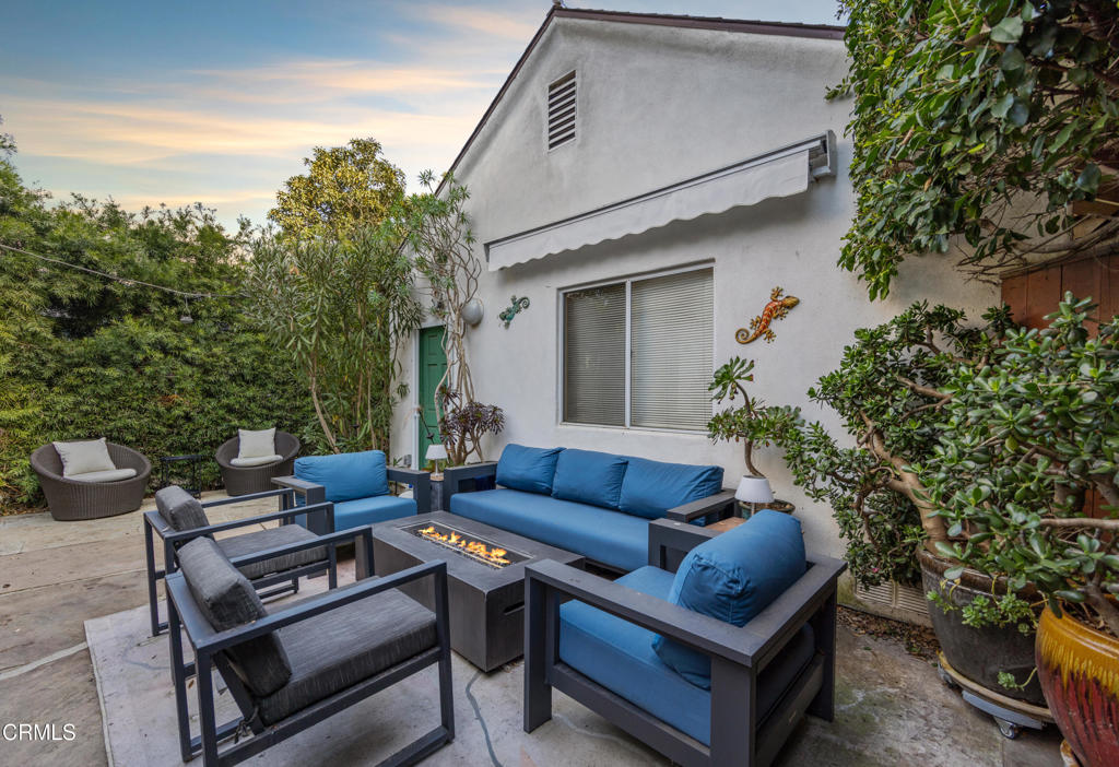 917 West W Victoria Street Santa Barbara, CA 93101 - Photo 21 of 28 a view of a patio with couches and a potted plant on a table