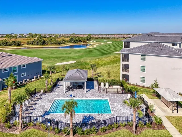 an aerial view of a house with a garden