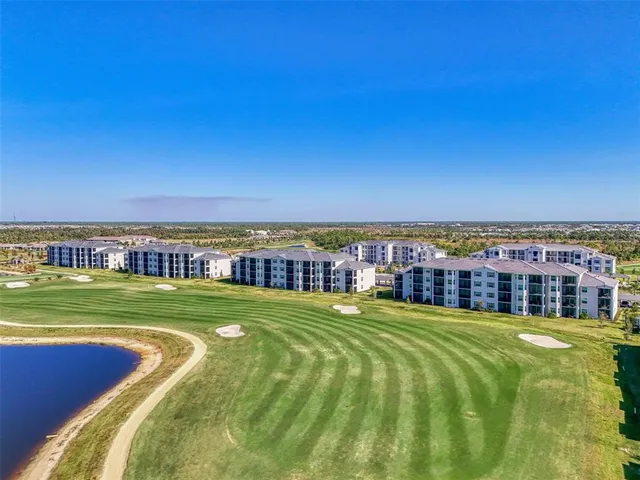 a view of a swimming pool with an ocean view