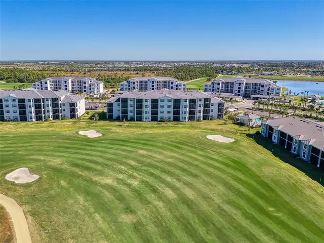 a view of a city with a building in the background