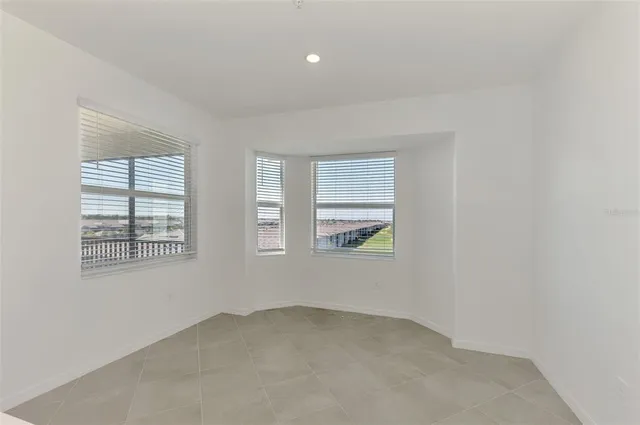 an empty room with windows