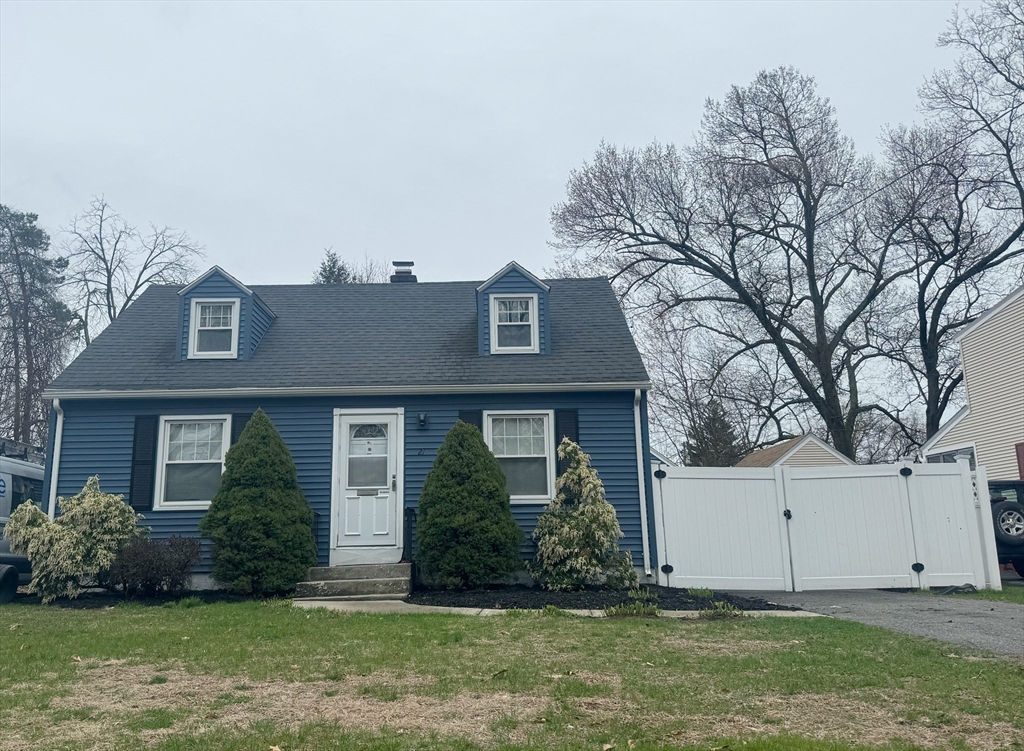 21 Morison Terrace Springfield, MA 01104 - Photo 1 of 42 a front view of house with yard and green space