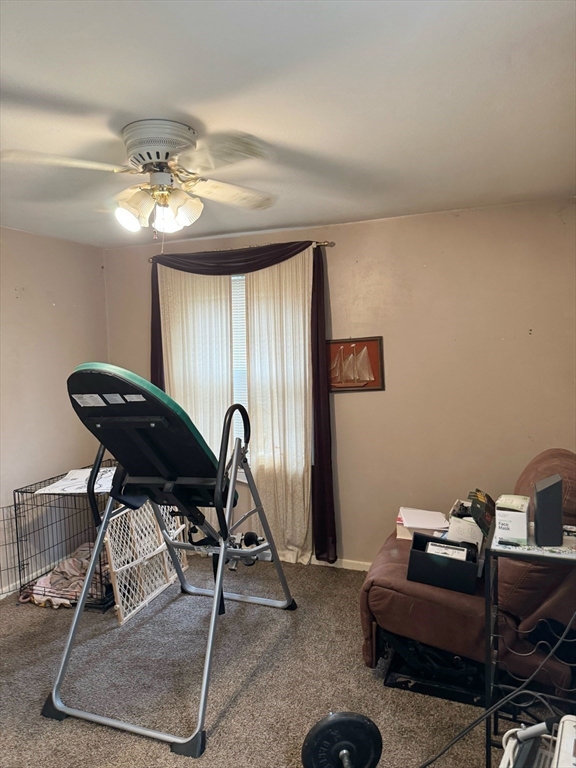 21 Morison Terrace Springfield, MA 01104 - Photo 24 of 42 a work room with furniture and a chandelier